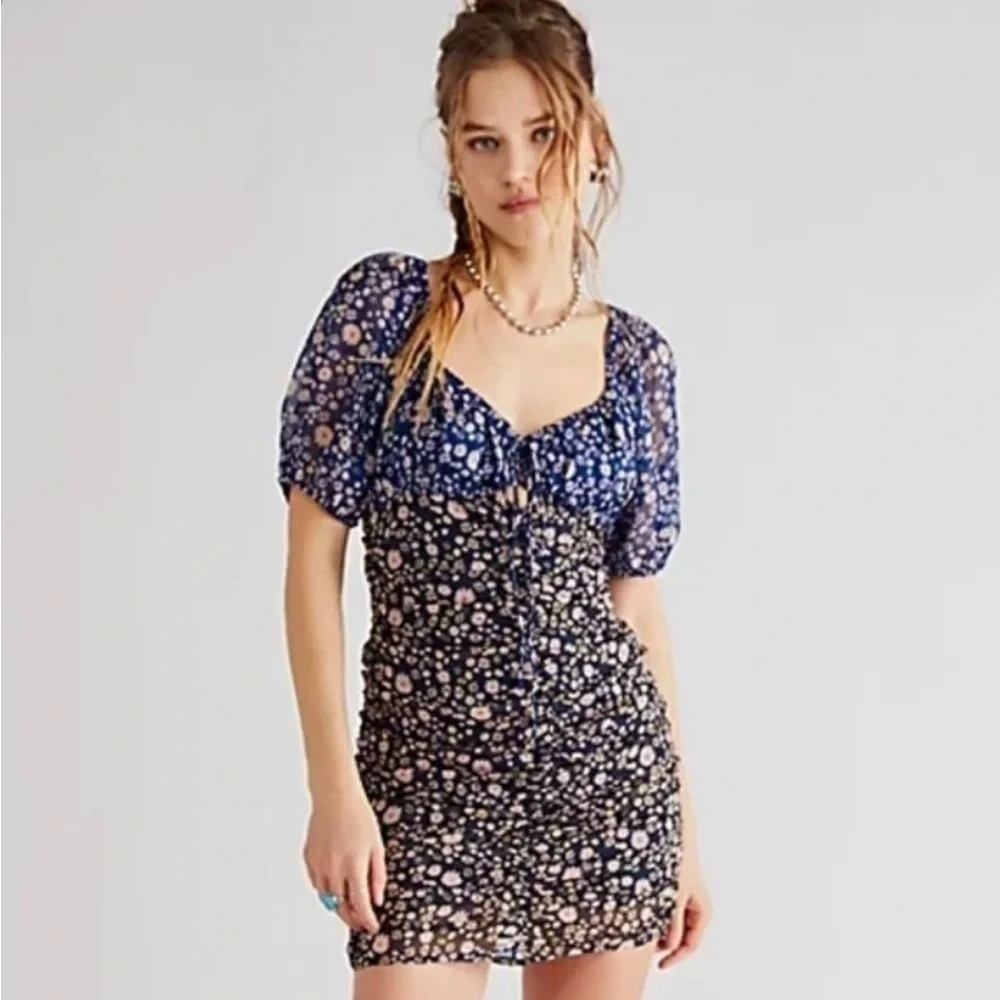 NWOT  Free People Tessa Dress. Size Small. Color is Night Combo